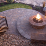 Update your deck area with a backyard fire pit.