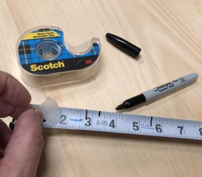 Add some masking tape to 1/2 of your tape measure to use it for marking project specific measurements. When done with the project just remove the tape and your measuring tape is good as new.