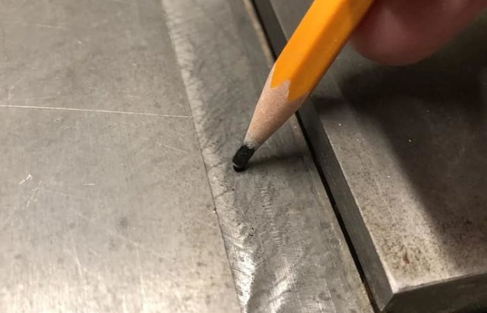 Use the graphite from your pencil led to help your miter gauge slide easily
