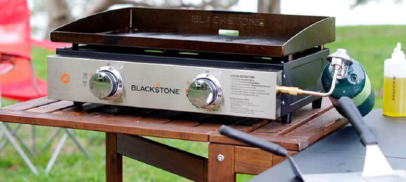 A Blackstone Griddle on an outdoor table.
