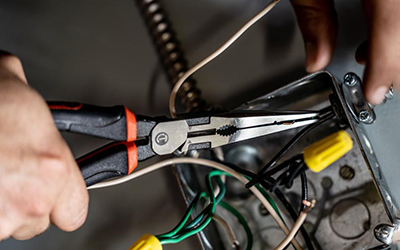 A Crescent Long Nose Pliers is used to twist wire together.