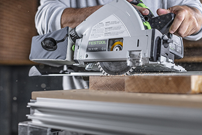 Festool's kickback stop technology in action as the saw is lifting off guide rail causing the blade to stop.
