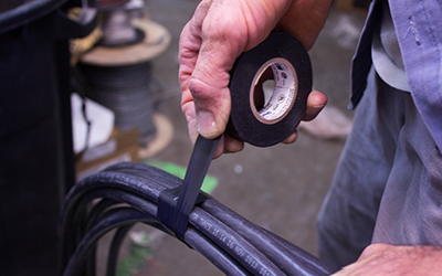 Shurtape Electrical Tape is used to bundle hoses.