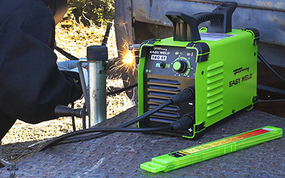 A Forney Industries Easy Weld 180 ST Welder is used on a camper.