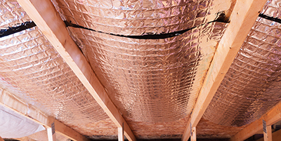 Reflective insulation in a ceiling.