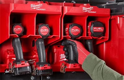 A Milwaukee cordless tool in hung in a tool station storage solution.