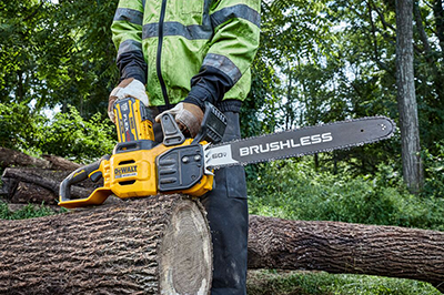 A battery is switched out on a DEWALT 60V MAX 20-Inch Chainsaw.