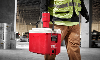 Milwaukee PACKOUT 30-ounce Tumbler attached to a PACKOUT 16QT Cooler.