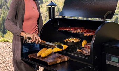 Corn is pulled off a Traeger PRO series grill.