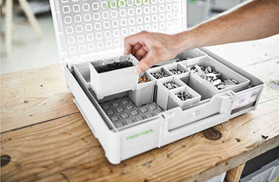 A cube is placed in a Festool Systainer Organizer.