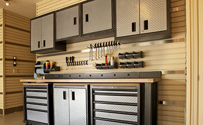Cabinets and tool boxes keep tools organized.