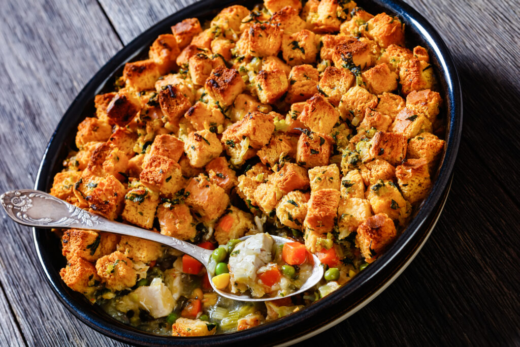 Baked casserole made from leftover turkey, stuffing, mixed vegetables, and gravy.